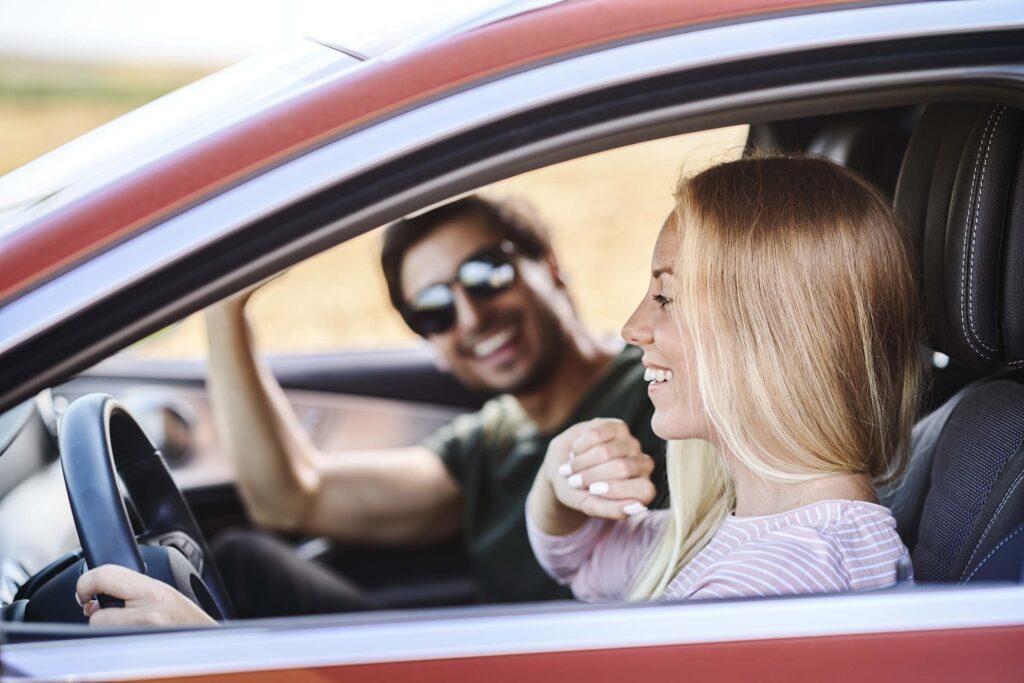 couple driving in the car M5H7HBA